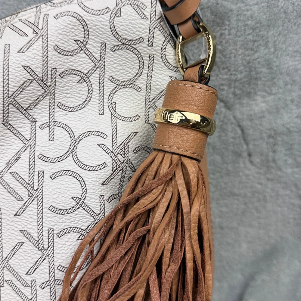 Calvin Klein Logo Print Hobo Bag in Cream and Brown
